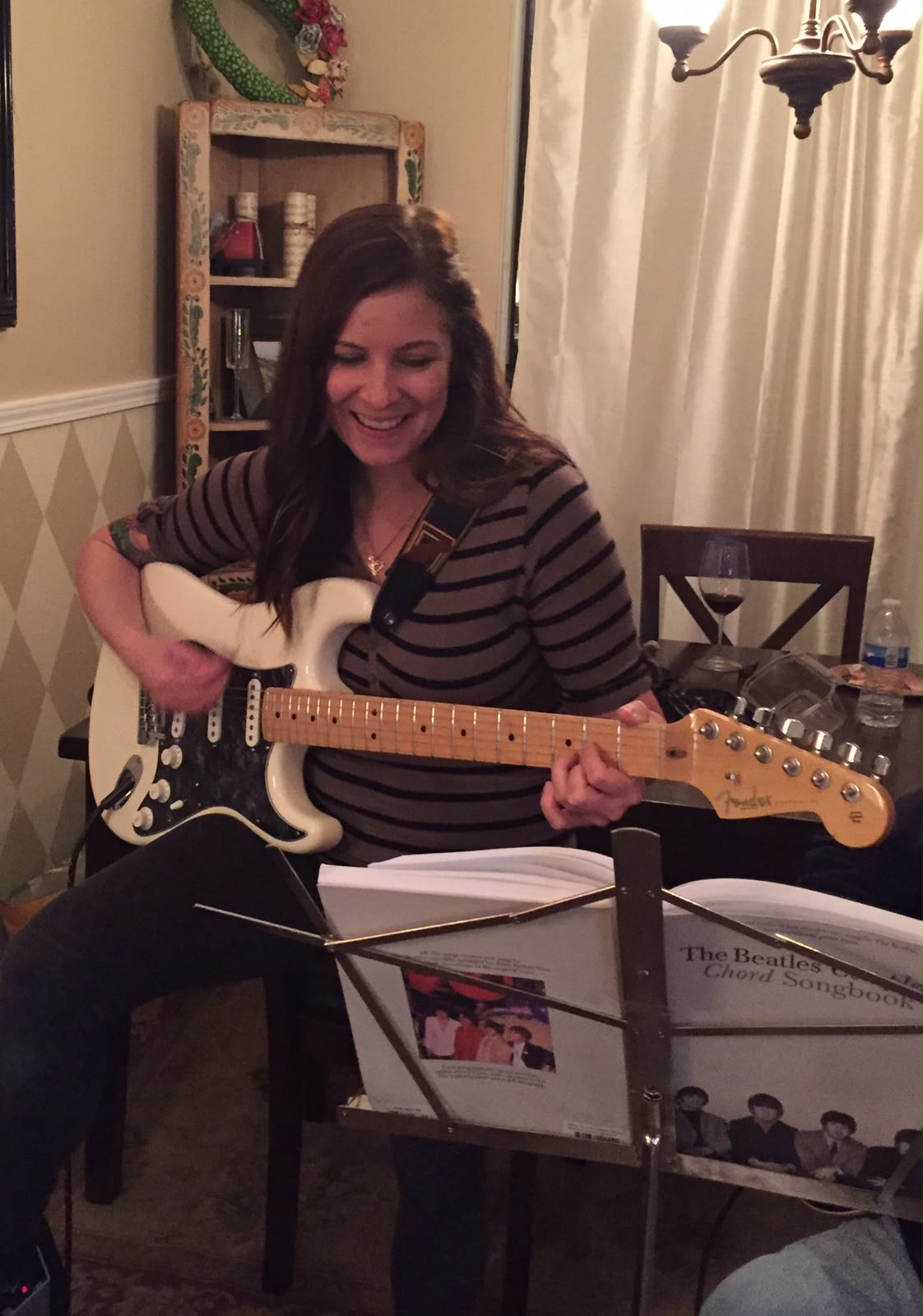 Katie playing guitar